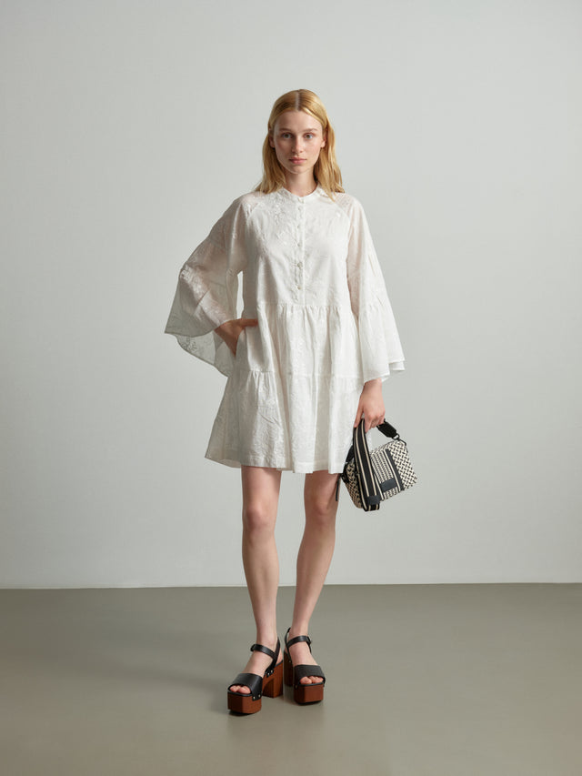 Dress Delmar magic garden embroidery white - Introducing Delmar, a caftan-inspired short dress in crisp white, crafted... - 1/3