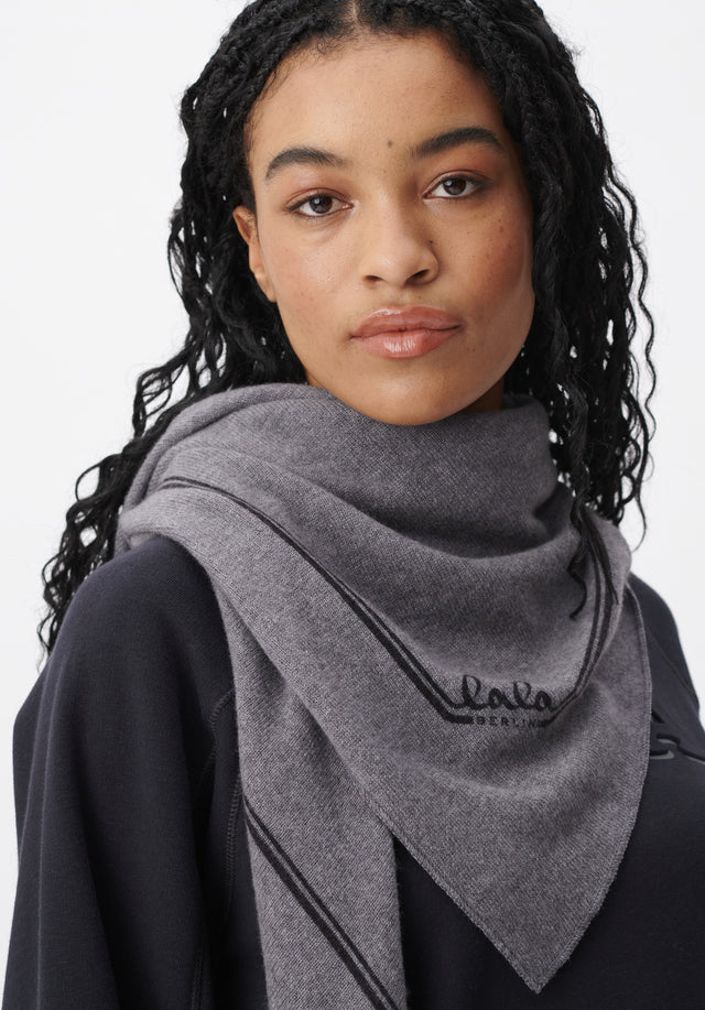 Triangle Solid black shades - The ultra-soft, versatile cashmere scarf comes with a subtle logo....
