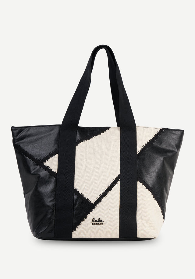 East West Tote Malwe dark egret black - The right combination of elegance and practicality. With a graphic...
